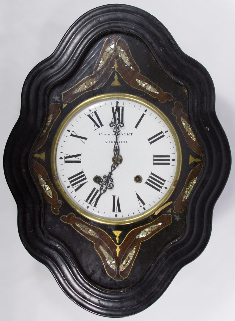 French Comtoise Wall Clock by Mayet & Morbier: French Comtoise Wall Clock by Mayet & Morbier Having a painted porcelain dial, mother of pearl decoration on the hinged glazed aperture and a wood case; including pendulum and key Height: 23.00 inches
