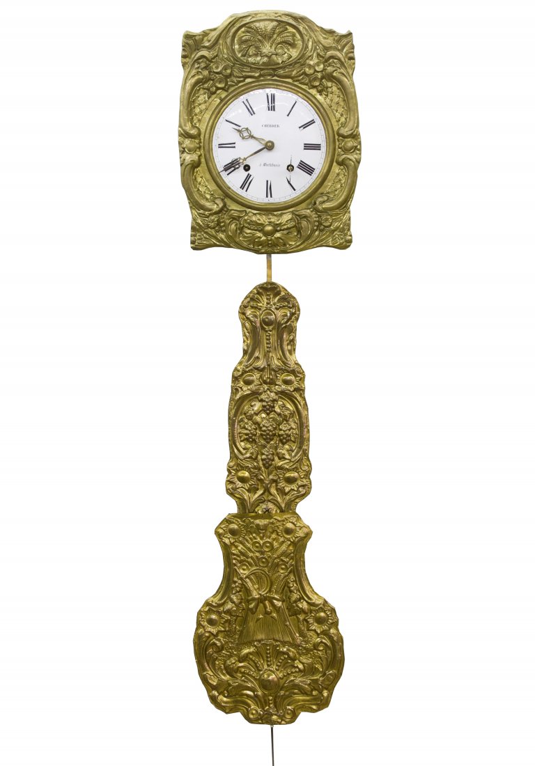 Comtoise Wag on the Wall Clock by Cherder a Montchanin: Comtoise Wag on the Wall Clock by Cherder a Montchanin Having a wheat sheath motif brass frame around porcelain enamel clock face, a wheat sheath designed pendulum; including the key and two weights H