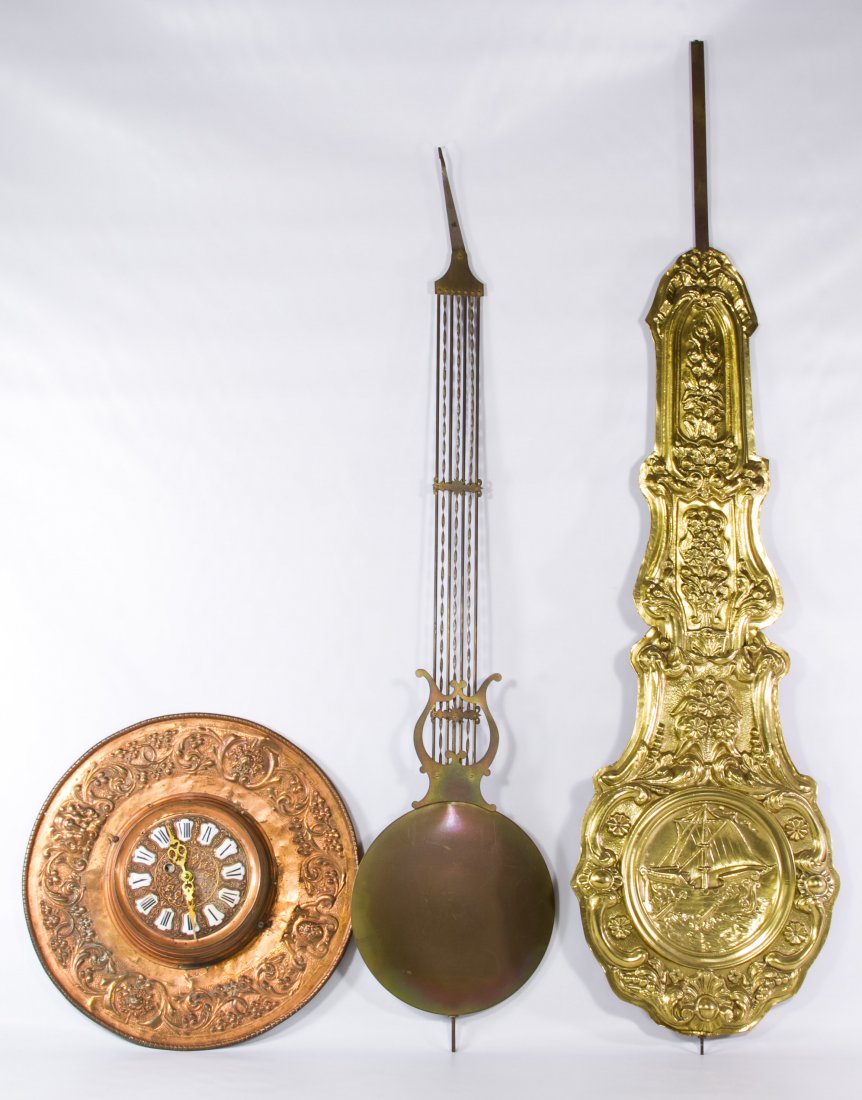 Wheat Sheath Pendulum: Wheat Sheath Pendulum Together with a large metal pendulum and a round copper wall clock Height: 46.50 inches (tallest) Category: Decorative Arts > Clocks Shipping Status: Due to size, weight, value o