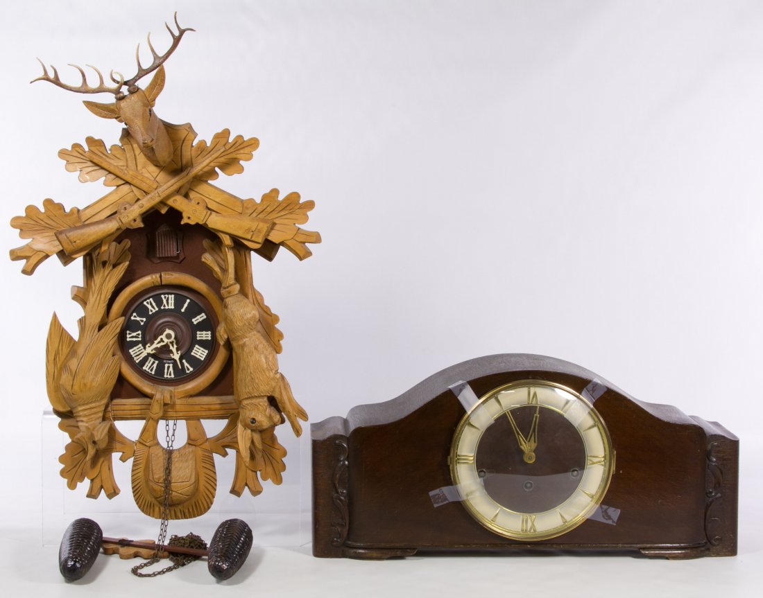 Cuckoo Wall Clock and Mantel Clock: Cuckoo Wall Clock and Mantel Clock Two items including a 'Haid Original' Art Deco style wood mantel clock and a German 'Regula' wood and plastic cuckoo clock made by Schmecklenbechel Height: 9.00 inch