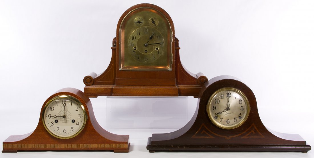 Mantel Clock Assortment: Mantel Clock Assortment Three items including a scrolled mahogany clock with a back plate mark 'Junghans Wurttemberg A21,' a Sessions inlay eight day movement clock and a Seth Thomas model E531-000 cl