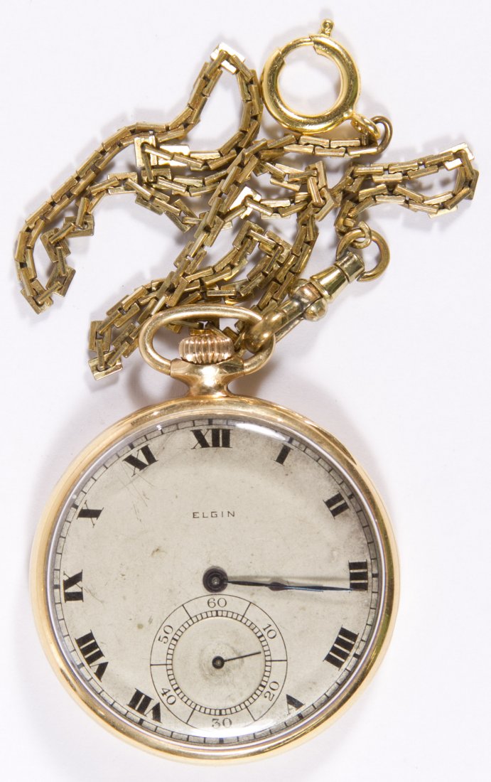 Elgin 14k Gold Open Face Case Pocket Watch: Elgin 14k Gold Open Face Case Pocket Watch Serial #22317675 dating to 1920, 17 jewels, grade 452, model 4 G M Wheeler, pendant wind and set; together with a gold filled watch chain Size: 14s Weight: 3