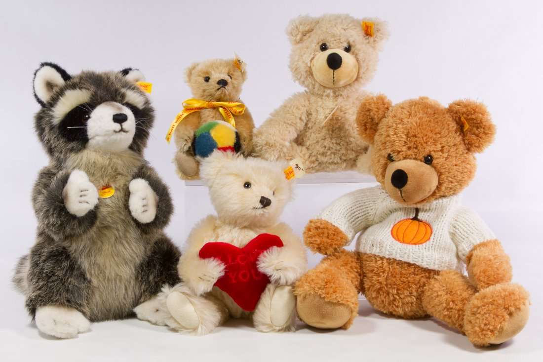 Steiff Animal Assortment: Steiff Animal Assortment Five contemporary plush animals with yellow ear tags including a bear with a pumpkin sweater, a bear with a red heart, a soft blonde bear, a raccoon and a bear with a ball Hei