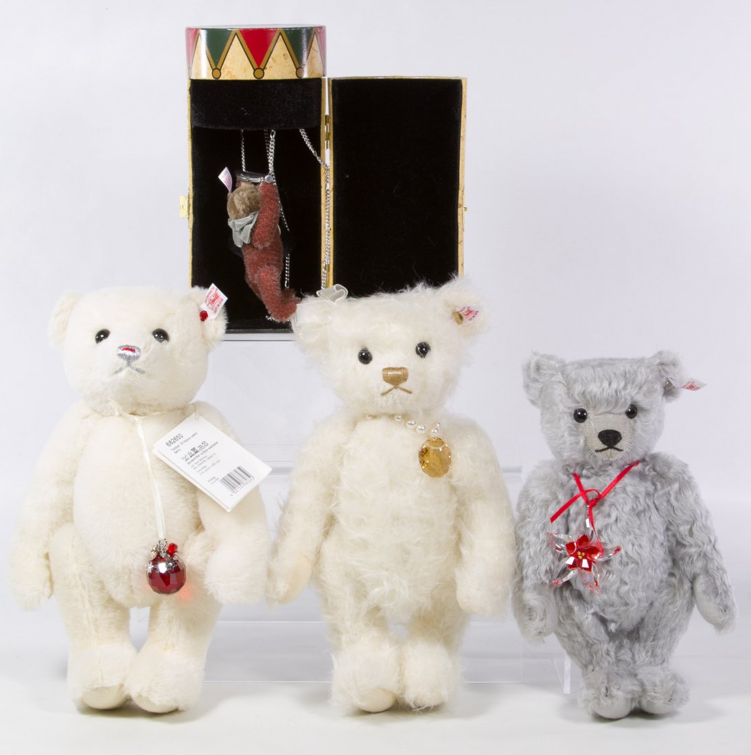 Steiff Bear Assortment: Steiff Bear Assortment Four contemporary items including a trapeze bear #669750 in original box, a white bear #035784, a white bear #682650 in original box and grey bear #681103 Height: 11.00 inches (