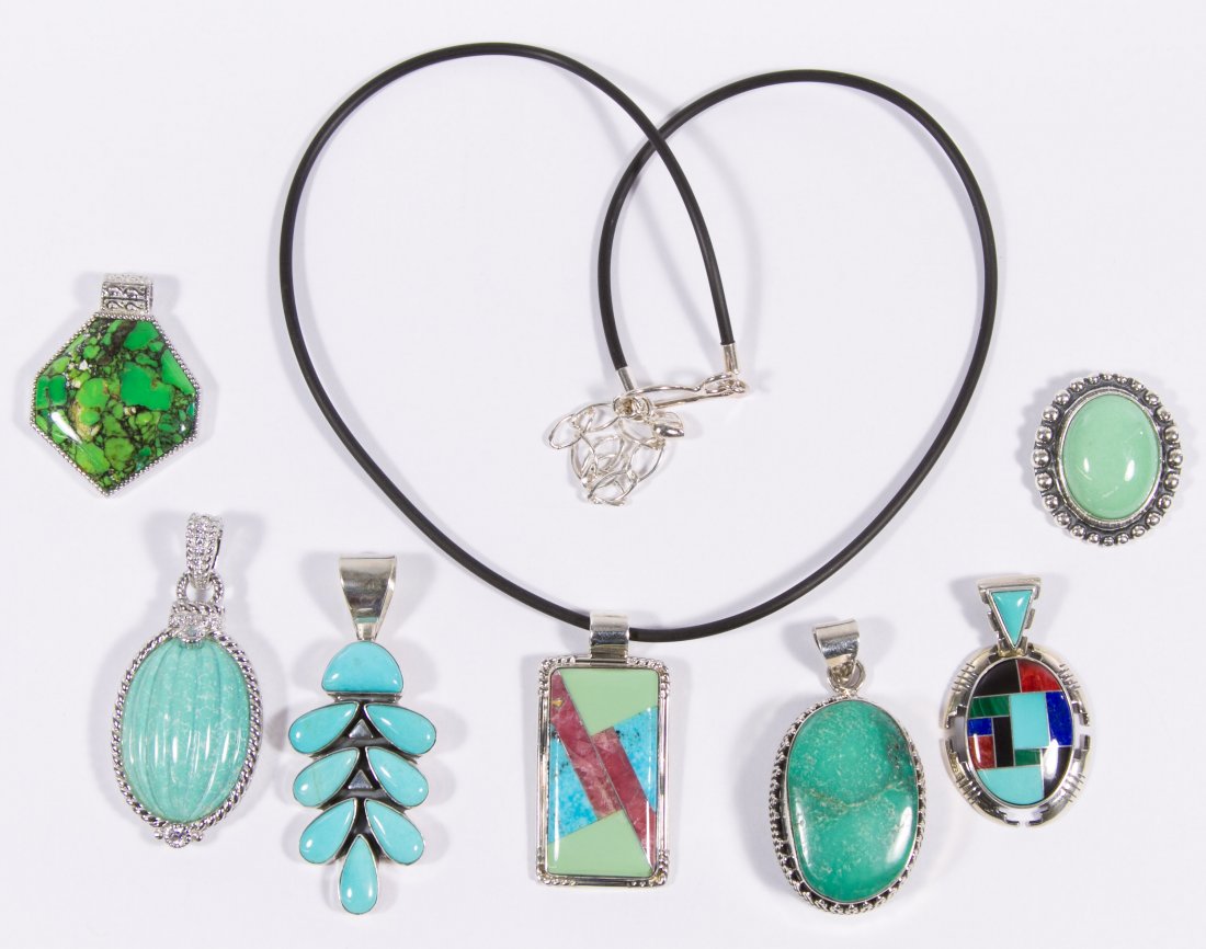 Sterling Silver Pendant Assortment: Sterling Silver Pendant Assortment Seven pendants adorned with various gemstones, one signed Judith Ripka, DTR (Dessert Rose Trading), CJ (Carlisle Jewelers); together with a rubber necklace having st