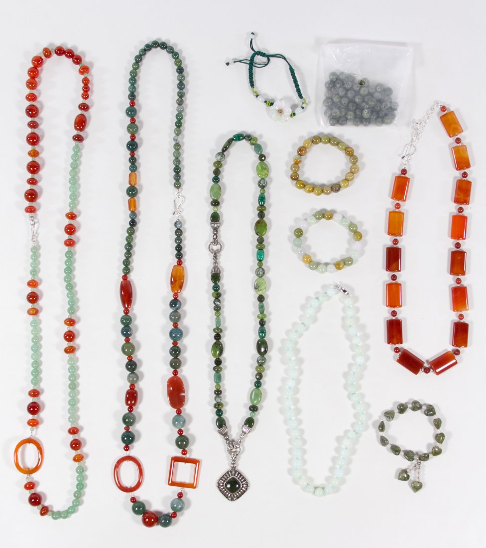 Carnelian and Jadeite Jade Jewelry: Carnelian and Jadeite Jade Jewelry Including five necklaces and four bracelets; together with a bag of loose beads Category: Jewelry and Timepieces > Costume Shipping Status: Leonard Auction, Inc. wil