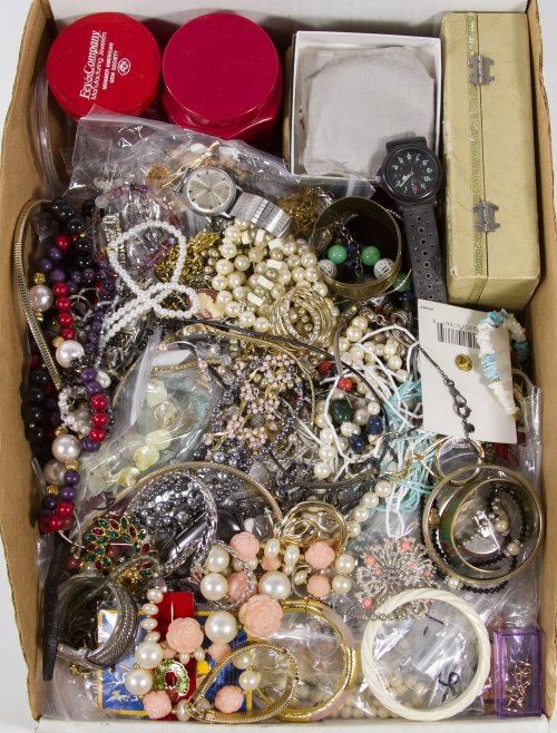 Costume Jewelry Assortment: Costume Jewelry Assortment Including necklaces, bracelets, earrings, watches and brooches with some signed including Napier, Express, Monet and Avon; together with jewelry cleaner and empty jewelry bo