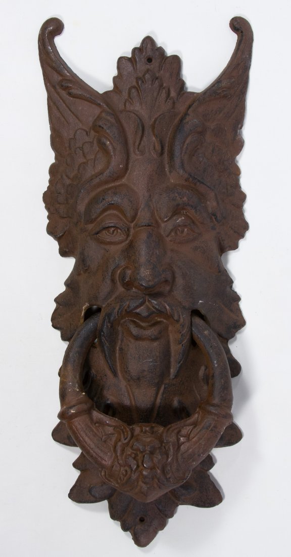 Cast Metal 'North Wind' Door Knocker: Cast Metal 'North Wind' Door Knocker Contemporary, having a semi-black finish Height: 20.00 inches, Width: 8.00 inches Category: Decorative Arts > Objects Tax Status: Subject to an 8.25% sales tax for