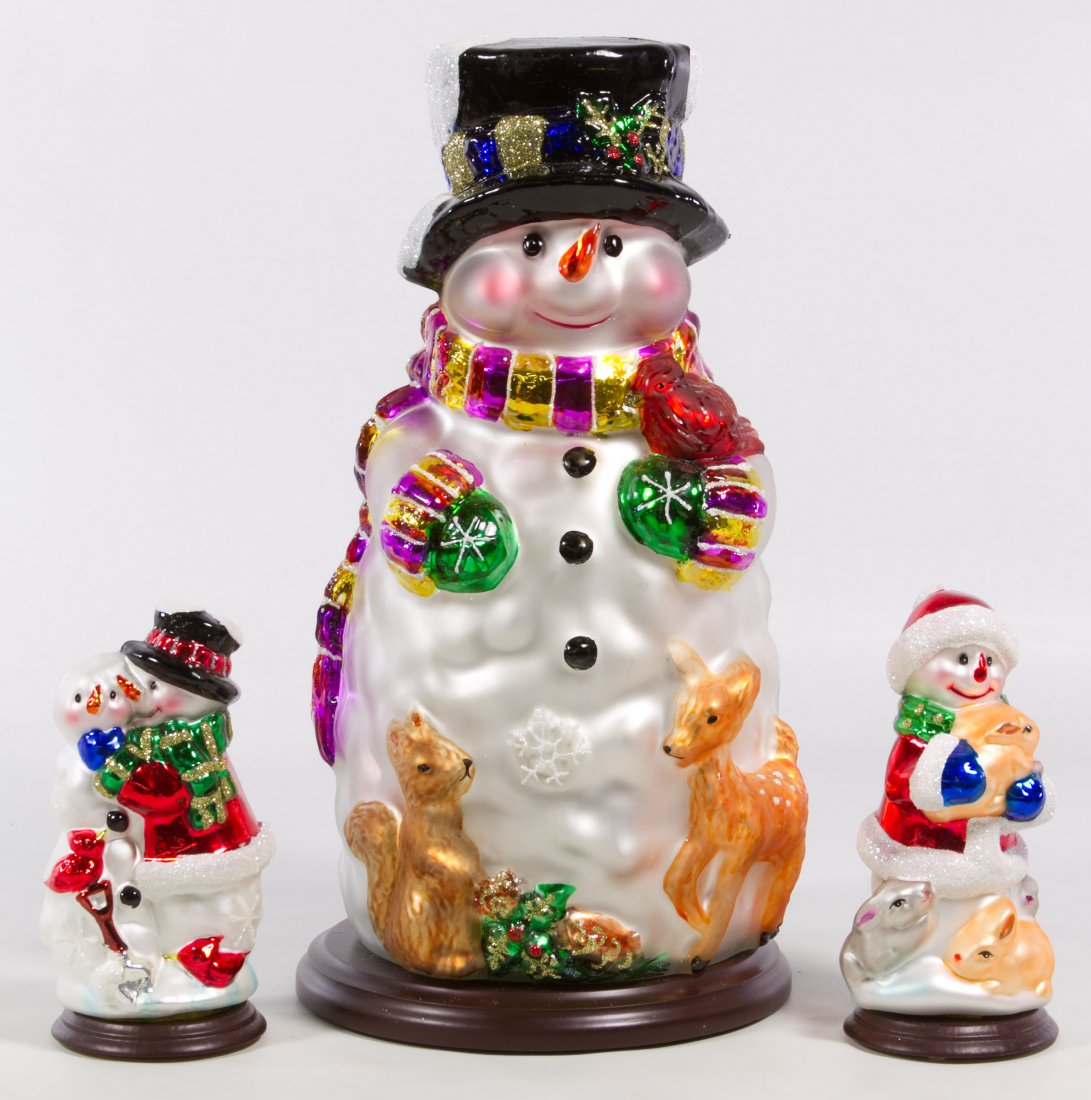 Thomas Pacconi Holiday Ornaments: Thomas Pacconi Holiday Ornaments Three glass items including a large snowman with two smaller snowmen; all with original box Height: 14.50 inches (tallest) Category: Collectibles > Holiday Shipping St