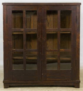 Arts and Crafts Style Oak Book Case: Arts and Crafts Style Oak Book Case Having double wood panel doors with twelve glass panes at front and three glass panes on each side Height: 43.00 inches, Width: 38.50 inches, Depth: 10.50 inches Ca