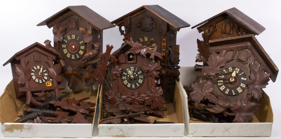 Cuckoo Clock Assortment: Cuckoo Clock Assortment Including six clocks with weights and bird form carvings with examples from Germany, Japan and the American Cuckoo Clock Company; together with eight cuckoo clocks with example