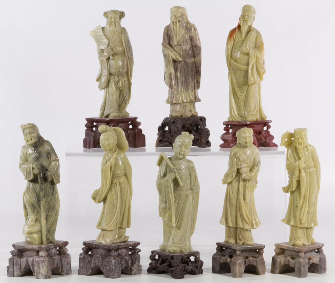 Carved Soapstone Asian Deity Figures: Carved Soapstone Asian Deity Figures Including eight green soap stone carved Asian male and female deity figures attached to carved bases; unmarked Height: 8.25 inches (tallest) Category: Decorative A