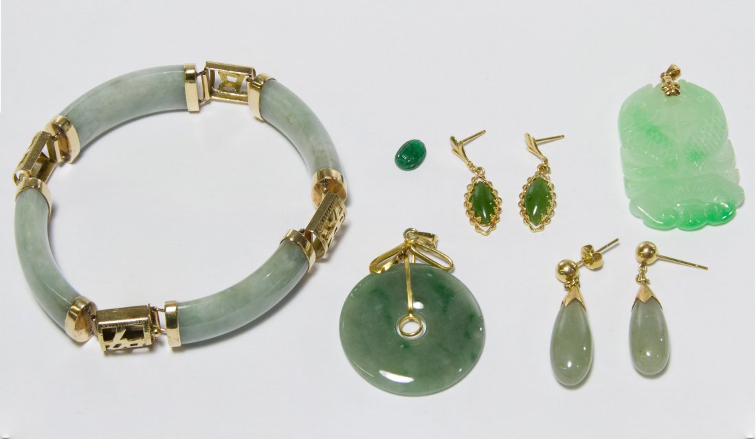 14k Gold and Jadeite Jade Jewelry Assortment: 14k Gold and Jadeite Jade Jewelry Assortment Including a bracelet, two pendants, two pair of pierced earrings and a tiny carved beetle Length: 7.50 inches Weight: 49.13 dwts. (total weight) Category: 