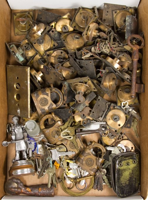 Lock, Key and Door Hardware Assortment: Lock, Key and Door Hardware Assortment Including Yale & Town brass padlocks, door, auto, clock and lock keys, brass switch plates and furniture parts; together with a 'CPW Castings Industries, Inc.' p