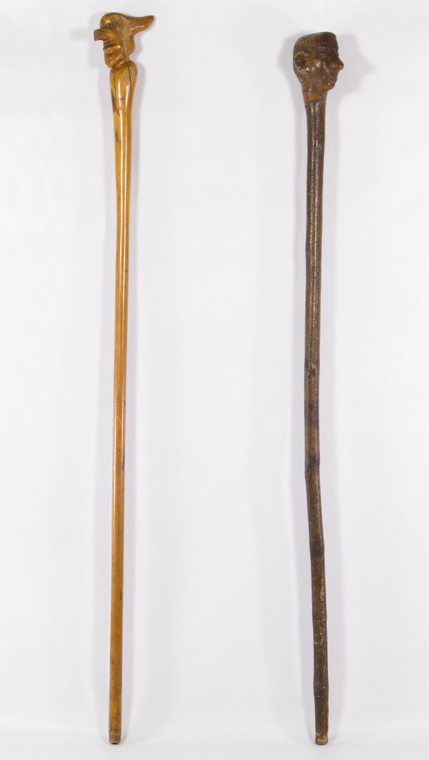 Hand Carved Wood Canes: Hand Carved Wood Canes Two canes having carved heads for handles Length: 34.50 inches (longest) Category: Clothing & Accessories > Canes Shipping Status: Due to size, weight, value or shipping complex
