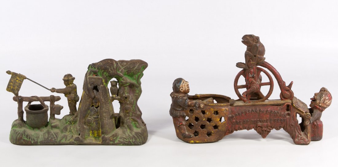 Boy Scout Camp Mechanical Bank: Boy Scout Camp Mechanical Bank Unmarked, depicting a boy scout with a flag; together with a reproduction 'Professor Pug Frogs' mechanical bank Width: 9.00 inches (boy scout bank) Category: Toys and Do