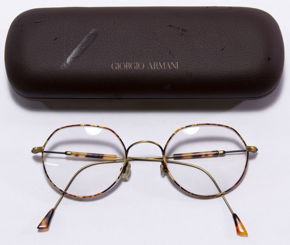 Giorgio Armani Eye Glasses: Giorgio Armani Eye Glasses Having thin wire frames with tortoise shell style plastic accents on the arms and the original case marked 'Made in Italy' Length: 5.00 inches Category: Clothing & Accessori