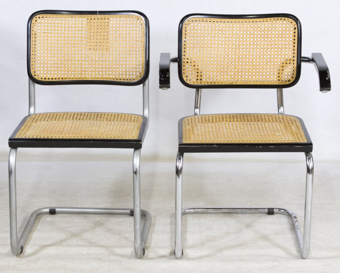 Mid-Century Modern 'Cesca' Chairs by Marcel Breuer: Mid-Century Modern 'Cesca' Chairs by Marcel Breuer Including an arm and a side chair having metal frame with wood arm pads and caning seat and back in a wood frame Height: 32.00 inches, Width: 24.00 i