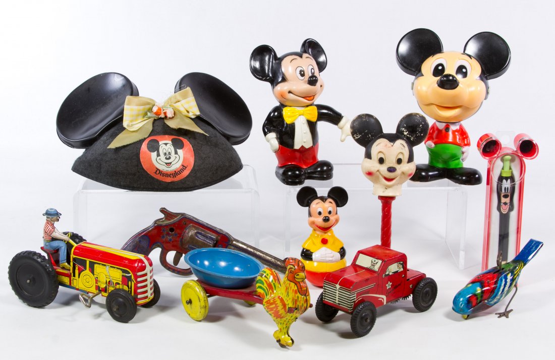 Mickey Mouse and Tin Wind-up Toys: Mickey Mouse and Tin Wind-up Toys Including a talking Mickey Mouse pull string toy, a Mouseketeer hat, vinyl toys and tin lithographed toys Height: 7.50 inches (tallest) Category: Toys and Dolls > Vin