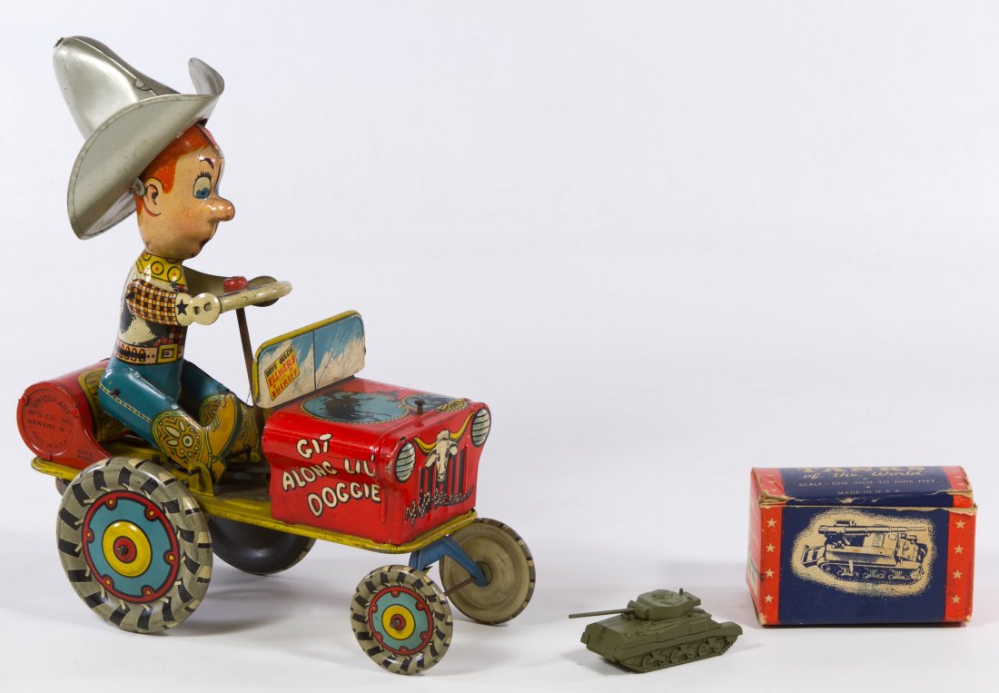 Unique Art 'Rodeo Joe' Crazy Car: Unique Art 'Rodeo Joe' Crazy Car Tin lithographed wind-up toy tractor; together with a toy British Sherman tank by Autenticast Height: 9.50 inches (tallest) Category: Toys and Dolls > Vintage Toys Shi