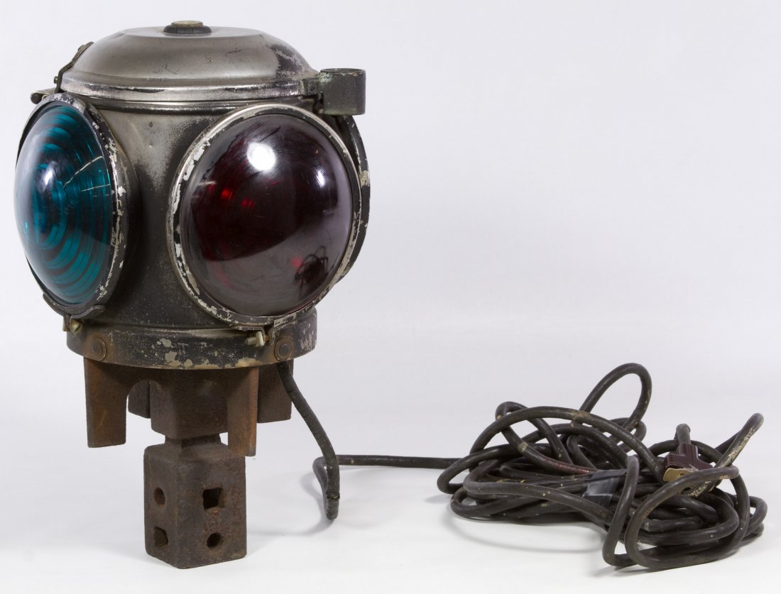 Electrified Dwarf Railroad Signal Lantern: Electrified Dwarf Railroad Signal Lantern Having two red and two green lenses and mounted on Chicago Bears tin can Height: 14.00 inches (light) Category: Collectibles > Transportation Shipping Status: