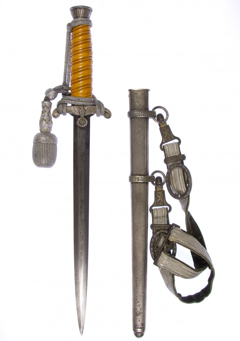 World War II German Army Officer Dagger: World War II German Army Officer Dagger By Holler with scabbard, portapee and hanger Length: 15.50 inches Category: Military & Weapons > World War II Shipping Status: Leonard Auction, Inc. will direct