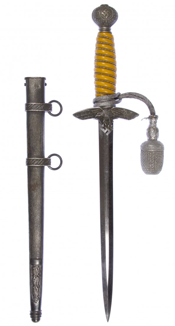 World War II German Luftwaffe Air Force Officer Dagger: World War II German Luftwaffe Air Force Officer Dagger Marked 'FW Holler / Soligen' on blade, with portapee; second model; having scabbard Length: 17.00 inches Category: Military & Weapons > World War