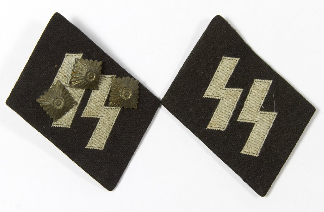 World War II German Nazi SS Collar Patches: World War II German Nazi SS Collar Patches Including two patches and three rosette collar tab pins Length: 2.00 inches (patch) Category: Military & Weapons > World War II Shipping Status: Leonard Auct