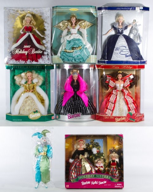Barbie 'Holiday' Doll Assortment: Barbie 'Holiday' Doll Assortment Seven Barbie dolls in original boxes including #20200, 19633, 24154, 12155, 19809, 17832 and K7958; together with a jester doll Height: 11.50 inches (doll) Category: T
