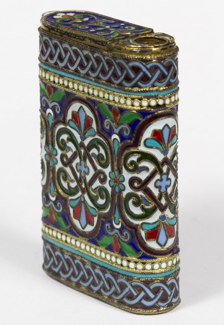 Pavel Ovchinnikov Russian Sterling Silver (.916) and: Pavel Ovchinnikov Russian Sterling Silver (.916) and Enamel Lighter Case Having a gold wash interior with a stamped hallmarks and a stamped 88 mark Height: 2.00 inches Weight: 1.54 ozt. (total weight)
