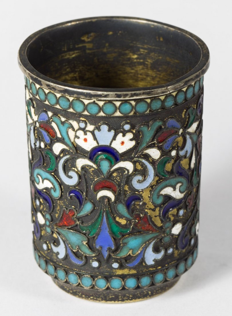 Vasily Andreyev Russian Sterling Silver (.875) and: Vasily Andreyev Russian Sterling Silver (.875) and Enamel Cup Early 20th Century, Moscow, stamped hallmarks to the underside and 84 mark, having a floral motif Height: 1.75 inches Weight: 0.95 ozt. Ca
