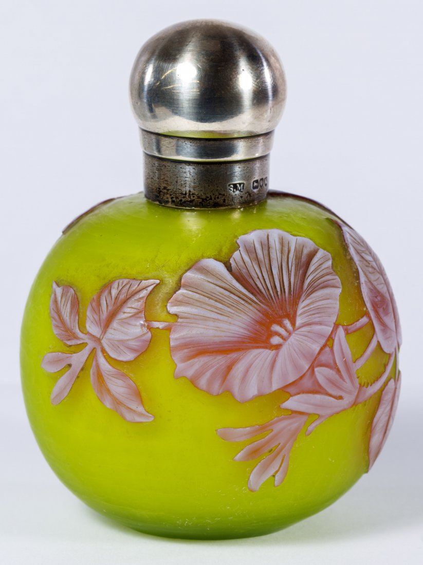 Thomas Webb & Sons Cameo Glass Perfume Bottle: Thomas Webb & Sons Cameo Glass Perfume Bottle c.1885; having three colors with cascading white over red morning glory flowers; sterling silver cap by Sampson Mordan, London Height: 3.50 inches Categor