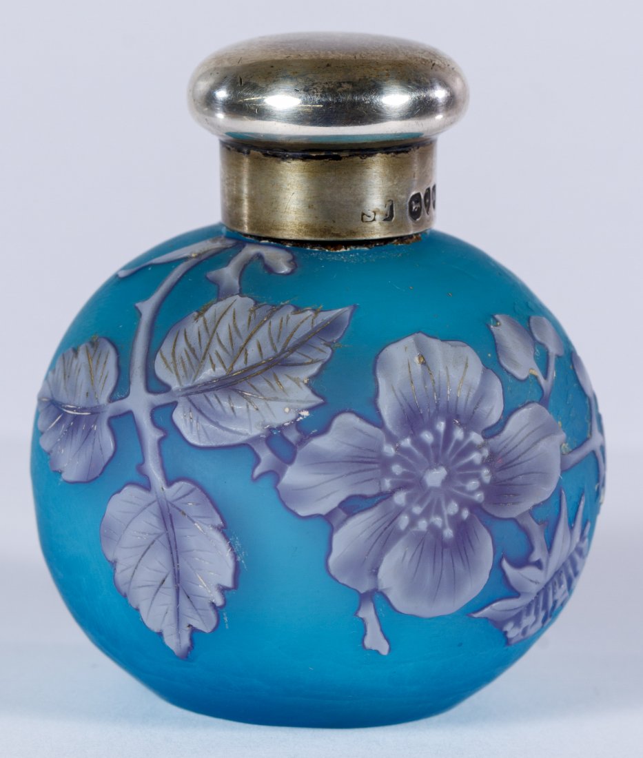 Thomas Webb & Sons Cameo Glass Perfume Bottle: Thomas Webb & Sons Cameo Glass Perfume Bottle c.1887; having three colors with white over cobalt on a Prussian blue background; sterling silver lid by Sampson Mordan, London; provenance: purchased by