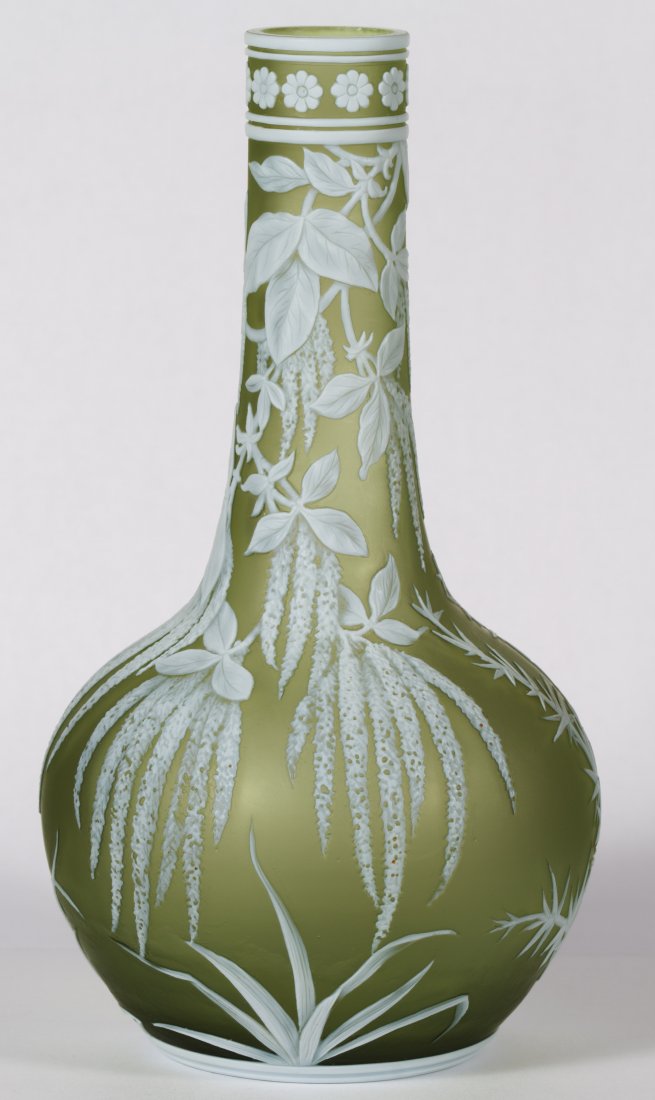 Thomas Webb & Sons Cameo Glass Vase: Thomas Webb & Sons Cameo Glass Vase Having a narrow neck, hanging Spanish moss with flowers on front and thistle branches on the reverse; 'Thomas Webb & Sons Cameo' mark on the underside Height: 7.00