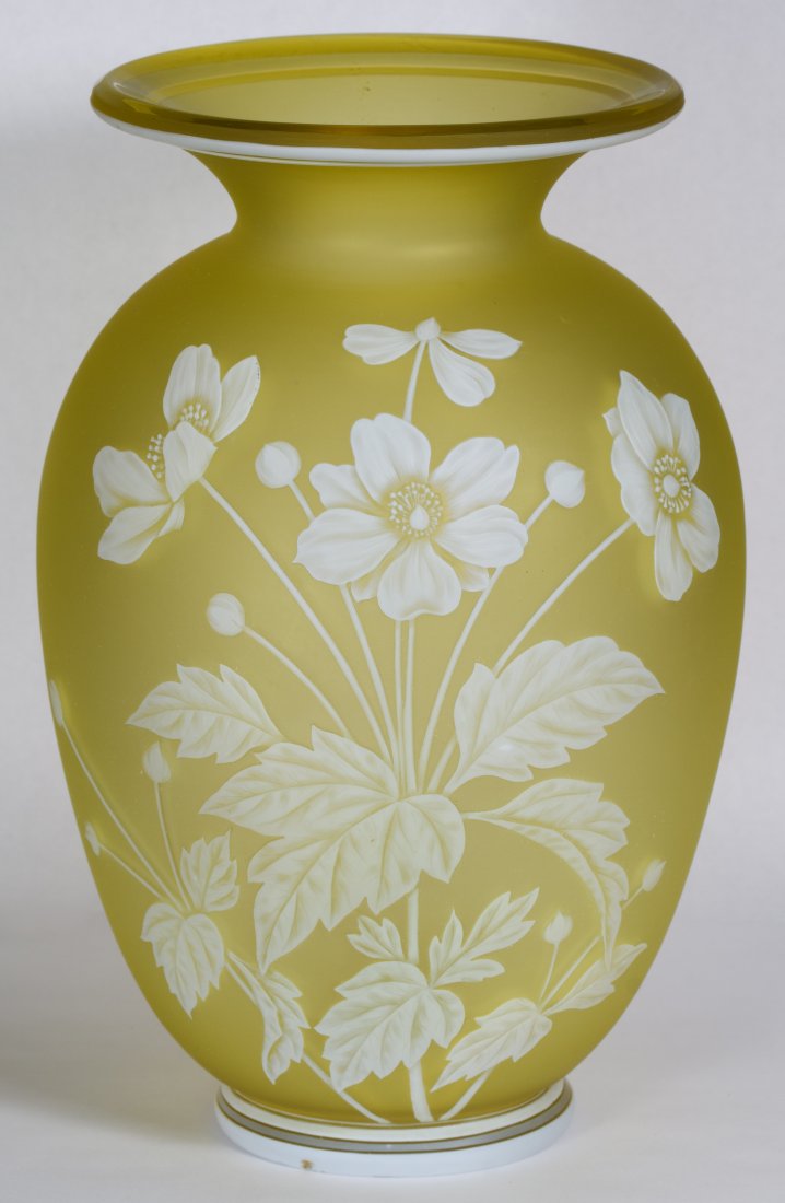 Thomas Webb & Sons Cameo Glass Vase: Thomas Webb & Sons Cameo Glass Vase Having a bulbous shape with flaring rim, branching floral spray with butterfly on the reverse; half moon signature on the underside Height: 9.00 inches Category: Gl