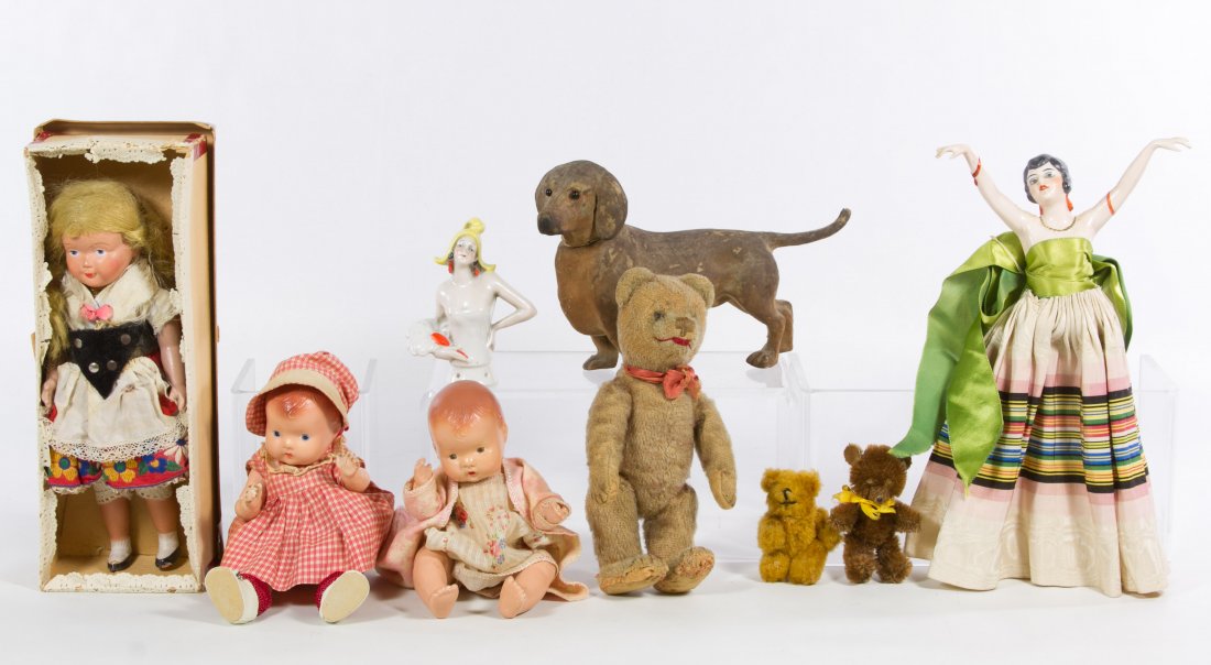 Composition Doll, Mohair Bear and Papier Mache Dog: Composition Doll, Mohair Bear and Papier Mache Dog Assortment Nine items including two Effanbee 'Baby Tinyette' composition dolls, a German dachshund papier mache candy container, two German half doll