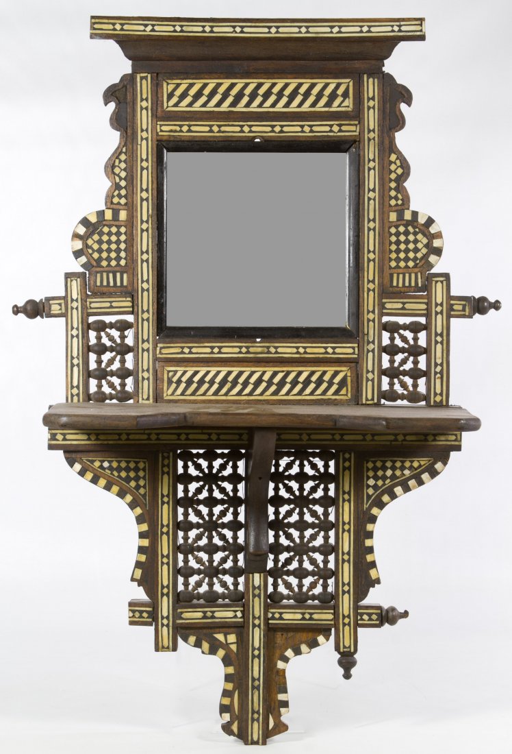 Indonesian Ebony and Bone Inlay Mirrored Wall Shelf: Indonesian Ebony and Bone Inlay Mirrored Wall Shelf Having a geometric design around a square antiqued mirror Height: 26.00 inches, Width: 17.50 inches Category: Decorative Arts > Mirrors Shipping Sta