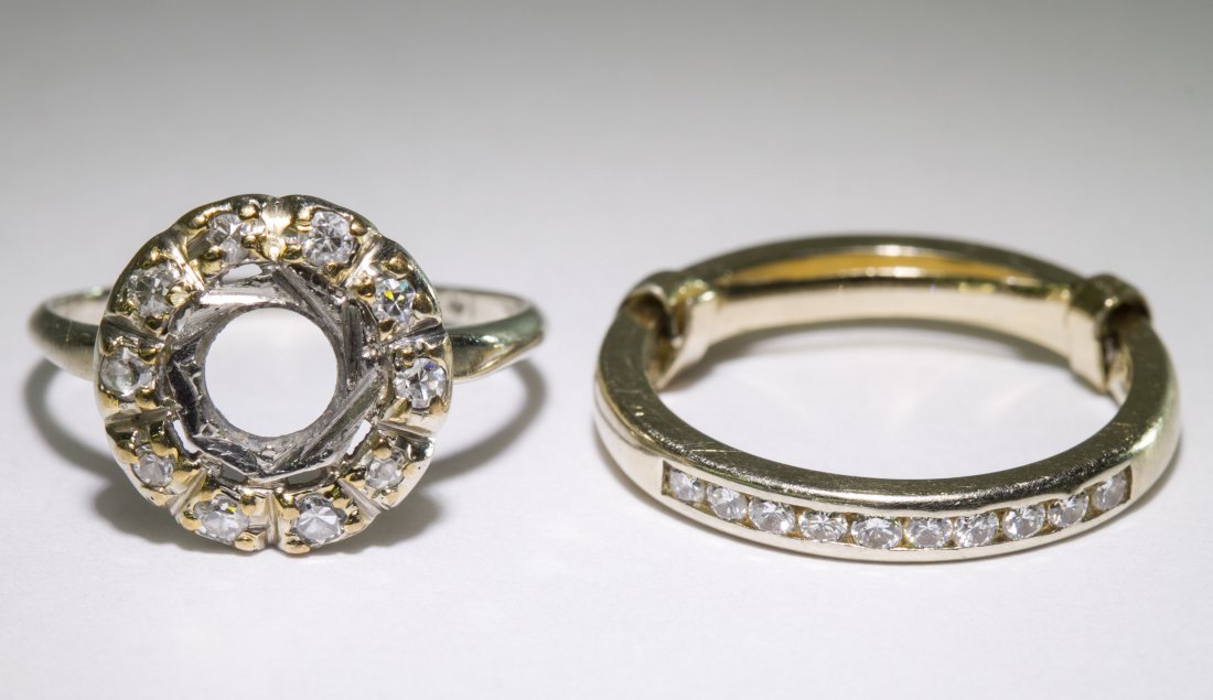 14k White Gold Rings: 14k White Gold Rings Two rings, one having ten round cut channel set diamonds with a sizing bar and the other having a circle of ten round cut diamonds Size: 6 & 6.5 Weight: 3.50 dwts. (total weight) 