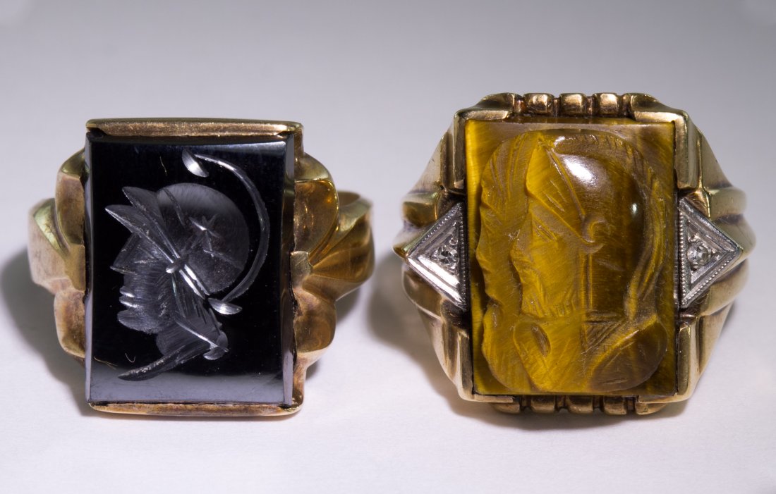 10k Gold Semi-Precious Gemstone Spartan Rings: 10k Gold Semi-Precious Gemstone Spartan Rings Two rings including a carved tiger eye and a carved marcasite Size: 7.5 & 8.5 Weight: 7.00 dwts. Category: Jewelry & Timepieces > 10k Gold Shipping Status