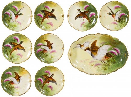 Limoges 'Coronet' Platter and Dish Set: Limoges 'Coronet' Platter and Dish Set Including eight dinner plates and a large oval platter with hand painted bird motif signed 'J. Barin' Length: 19.00 inches (platter) Category: Porcelain & Cerami