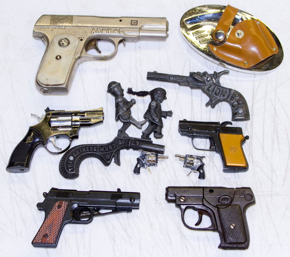 Junior Police Chief and Army 45 Cap Guns: Junior Police Chief and Army 45 Cap Guns Together with four decorative guns, a gun lighter and a gun knife Length: 6.50 inches (longest) Category: Sporting Goods > Replica Guns Shipping Status: Leonar