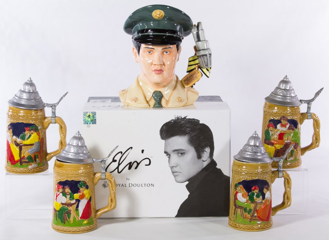 Royal Doulton 'Elvis GI Blues' Toby Mug: Royal Doulton 'Elvis GI Blues' Toby Mug In original box; together with four beer steins Height: 8.50 inches (mug) Category: Figurines > Royal Doulton Shipping Status: Due to size, weight, value or shi