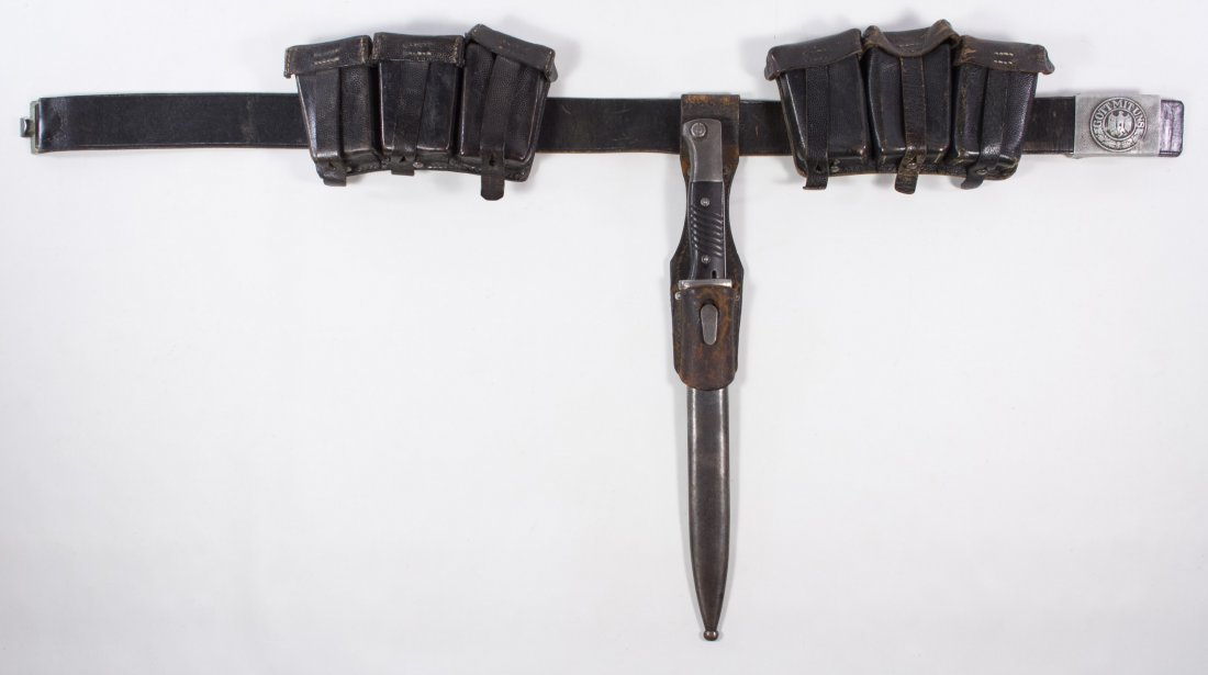 World War II German Army Accessory Belt: World War II German Army Accessory Belt Including bayonet, buckle and two ammo pouches on a leather belt Length: 36.00 inches (leather belt) Category: Military & Weapons > World War II Shipping Status
