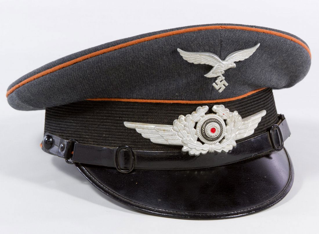 World War II German Luftwaffe E M Signals: World War II German Luftwaffe E M Signals Communications Operator Hat c.1939, having orange piping, oak leaf crest and swastika eagle Length: 11.00 inches, Width: 10.00 inches Category: Military & Wea