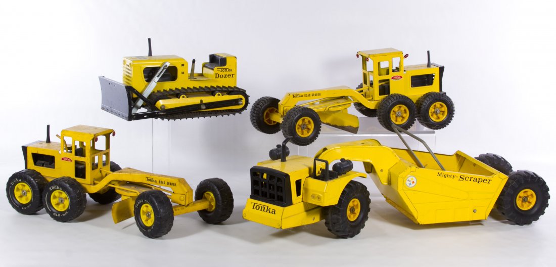Tonka Truck Assortment: Tonka Truck Assortment Four items including two Road Scrapers, a Mighty Bulldozer and a Mighty Scraper Length: 28.00 inches, Width: 8.00 inches (scraper) Category: Toys and Dolls > Vintage Toys Shippi