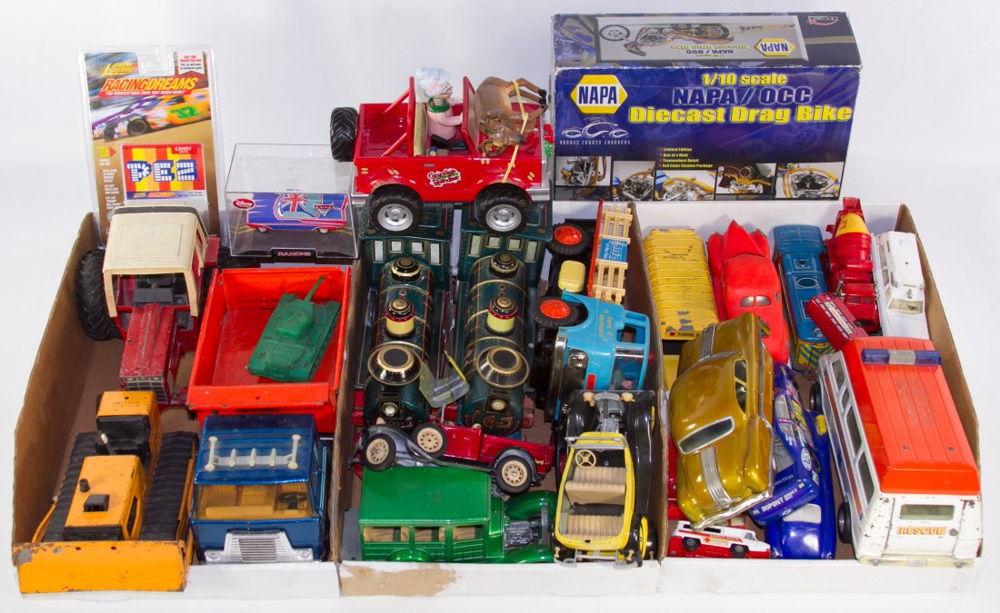 Die Cast and Metal Toy Vehicle Assortment: Die Cast and Metal Toy Vehicle Assortment Including trucks, cars, buses, trains and racers with examples from Hubley, Tonka and Ertl; three boxes Length: 12.00 inches (train) Category: Toys and Dolls