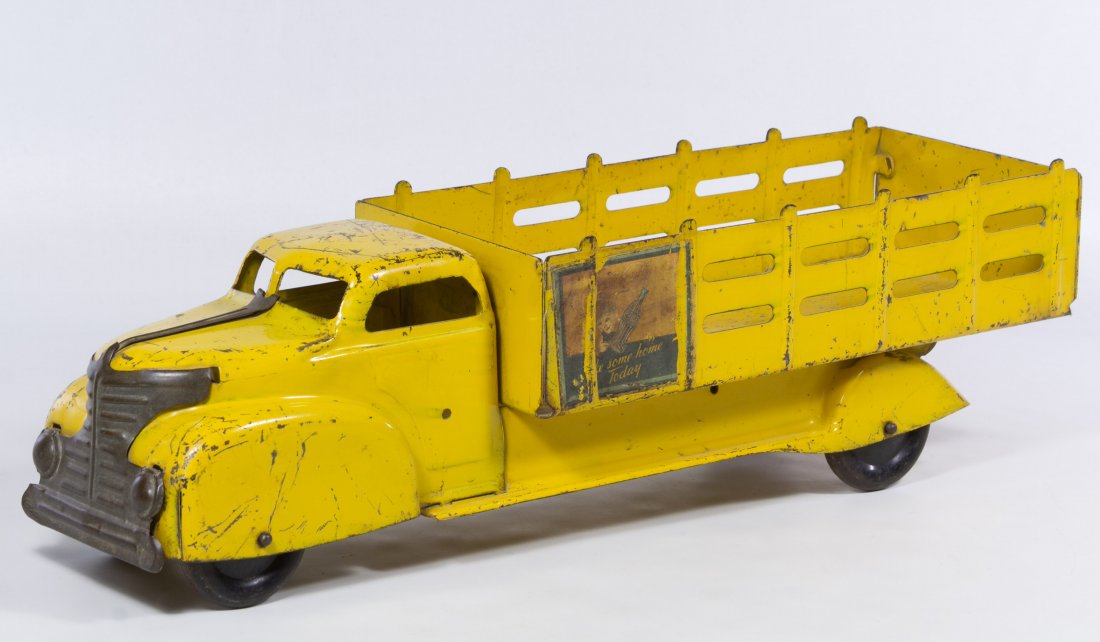 Marx Coca-Cola Toy Truck: Marx Coca-Cola Toy Truck Having the Marx embossed logo on the underside, and paper Coca Cola advertisements on the side panels Length: 20.50 inches Category: Toys and Dolls > Vintage Toys Shipping Sta