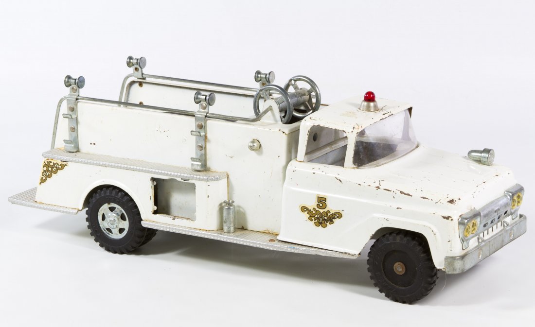 Tonka No.5 Pressed Steel Fire Truck: Tonka No.5 Pressed Steel Fire Truck c.1940, having a white body and applied stickers Length: 17.50 inches Category: Toys and Dolls > Vintage Toys Shipping Status: Due to size, weight, value or shippin