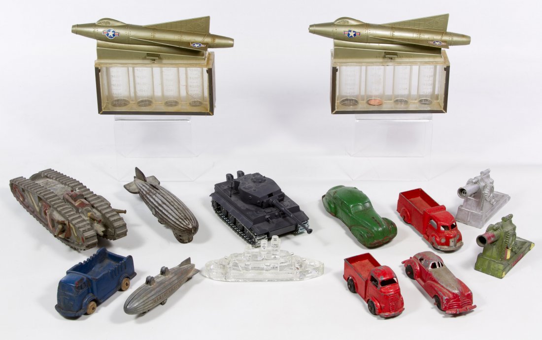 Toy Vehicle and Bank Assortment: Toy Vehicle and Bank Assortment Fourteen items including examples from Auburn Rubber Company, Tootsietoy, Manoil and Solido Length: 9.00 inches (longest) Category: Toys and Dolls > Vintage Toys Shippi