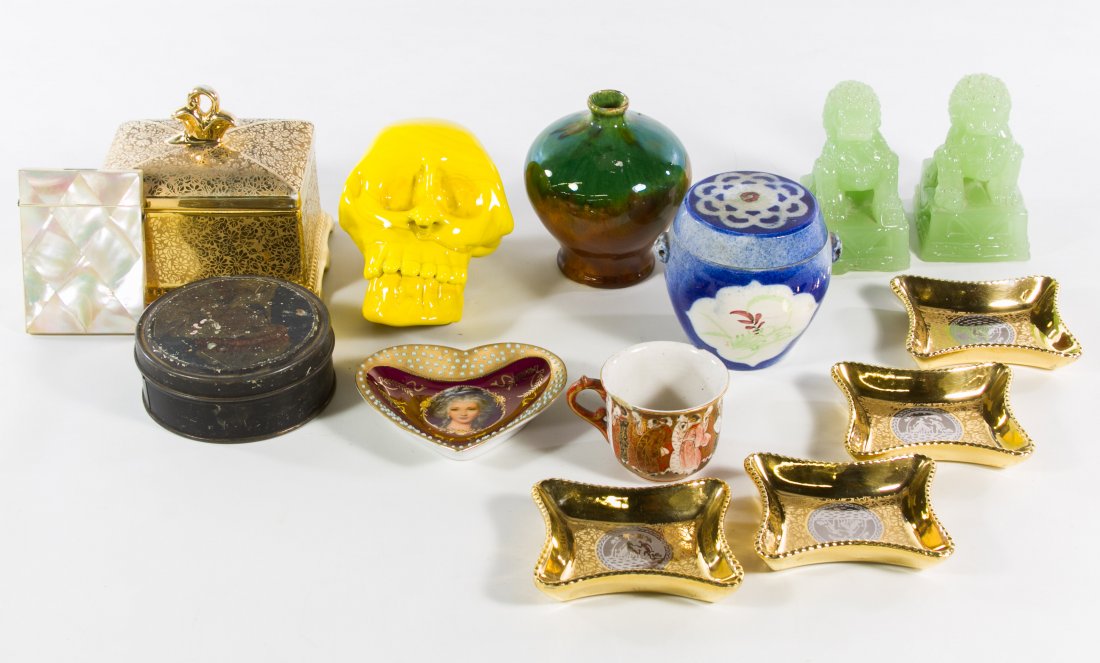Porcelain and Ceramic Assortment: Porcelain and Ceramic Assortment Ten items including a skull, vase and dishes; together with a tin can, jadeite glass foo dogs and cigarette case Height: 4.50 inches (tallest) Category: Porcelain & Ce